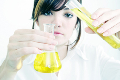 Woman and beaker